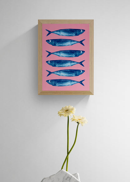 Sardines art print by PTRVRKD, blue fish on pink background, pop art seafood illustration A5, modern graphic wall art.