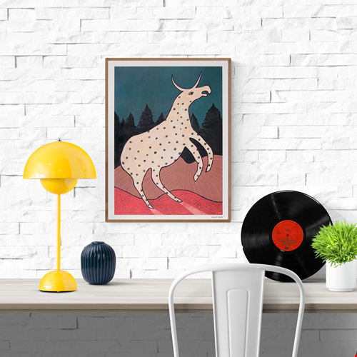 Surreal illustration titled Beest 2 by Louise de Meester, featuring a fantastical cream-colored creature with black spots and a single horn, set against a twilight forest backdrop with bold red terrain and a deep teal sky