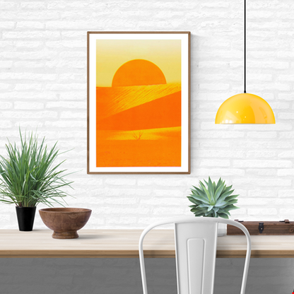 Risograph art print ‘Sossusvlei’ by PTRVRKD, featuring a bright orange desert landscape with a rising sun, minimal dunes, and a solitary dry tree, printed on Munken Pure Rough paper in A3 size. Limited-edition modern landscape artwork inspired by the Namib Desert.