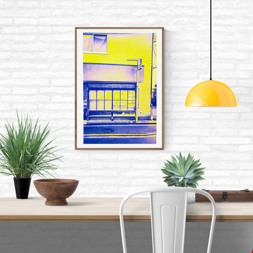 Limited edition A3 risograph print by PTRVRKD depicting a minimalist Kyoto house front in bold neon yellow and deep blue tones, Japanese architectural details, modern graphic style, contemporary wall art for home decor, perfect for Japan lovers and design enthusiasts.
