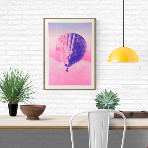 A3 risograph print of a pink and blue hot air balloon floating over dreamy clouds by PTRVRKD, hand-printed on 300 gsm Biotop paper.