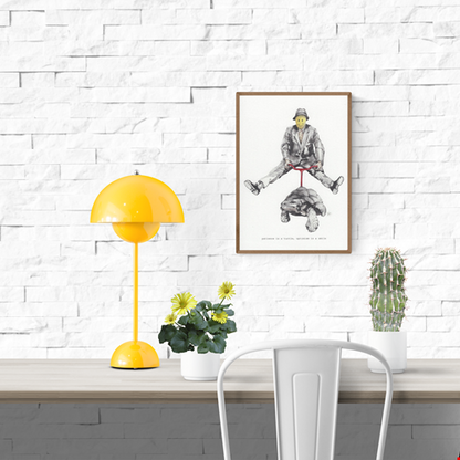 A5 art print of a surreal scene showing a man with a yellow smiley face riding a turtle, illustrated by Belgian artist FAB – symbolic illustration about patience and optimism with a poetic caption