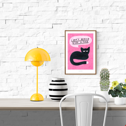 Whimsical art print of a black cat with attitude and the phrase “I don't really give a fuck” on a pink background, modern illustration by Just Cool Design, A4 giclée print on 230g matte paper.