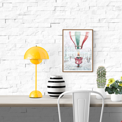 Whimsical illustration by Stien van Kerckhoven showing a child in a red hot air balloon basket with flames above his head, floating gently in a schoolyard among playing children. Dreamy and poetic digital art print in soft pastel tones, perfect for adding warmth and imagination to home decor.