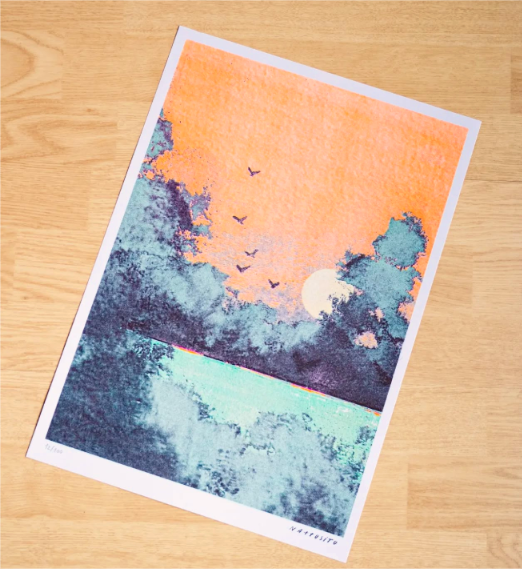 Dreamy four-color risograph art print titled Au lendemain by French artist Nattosito, featuring a soft coral sunrise over turquoise water with silhouetted trees and birds in flight. A limited edition A3 print on Munken Print White paper—perfect for modern, minimalist, and nature-inspired interiors.