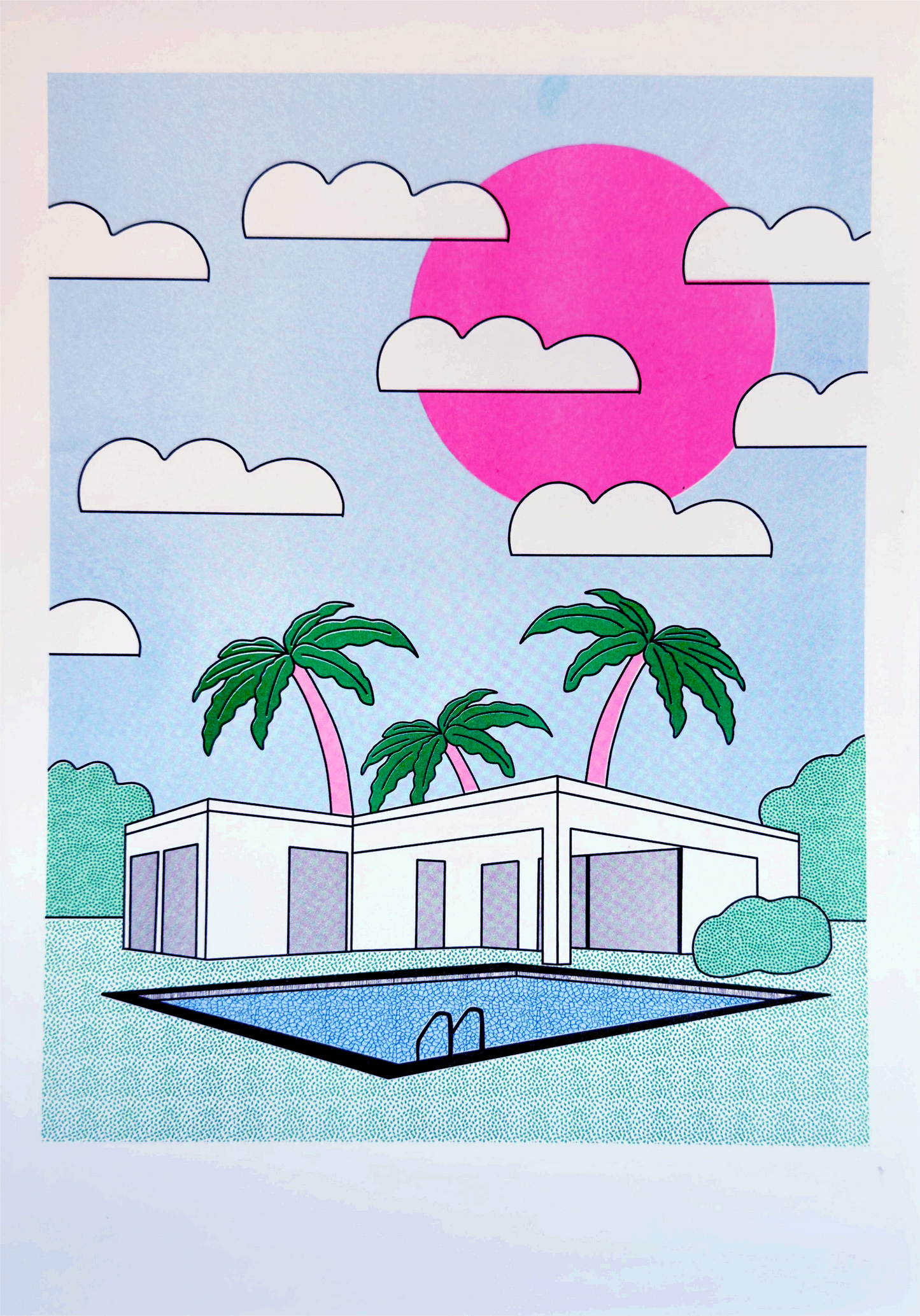 A3 risograph art print titled Palm Springs by Belgian illustrator Studio Stoutpoep. Features a retro white villa with palm trees, a blue pool, and a bold pink sun in a surreal Californian landscape. Printed on recycled paper in Belgium.