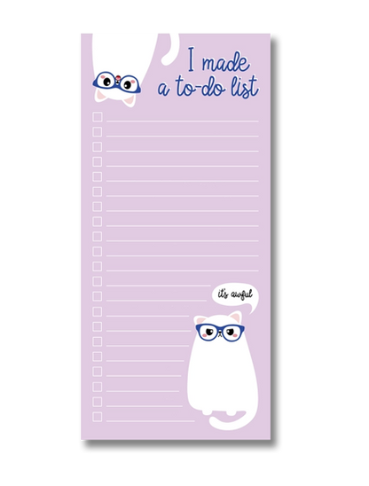 Funny to-do notepad in soft lilac featuring a white cartoon cat with glasses and a sarcastic speech bubble that says "it's awful", perfect for list lovers who appreciate humor – designed by Studio Inktvis in the Netherlands.