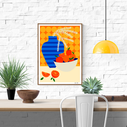 Colorful graphic illustration of a blue-striped vase with leaves and a bowl of oranges on a retro kitchen table, set against a bold orange patterned wall – Oranges on Retro Kitchen by Teresa Rego, A3 art print.