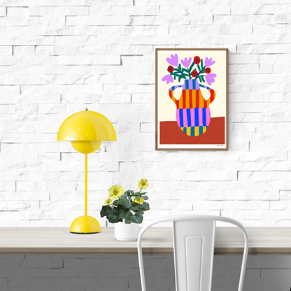 “Striped Vase With Handles” by Teresa Rego – vibrant A4 fine art print featuring a multicolored striped vase with blooming red and lavender flowers, printed on high-quality Munken Pure paper. Colorful wall décor made in Portugal.