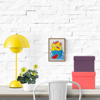 A5 risograph art print titled Lemonade by Teresa Rego, featuring a colorful blue cup filled with lemons, strawberries, and a slice of watermelon – limited edition Portuguese illustration on 150g paper.