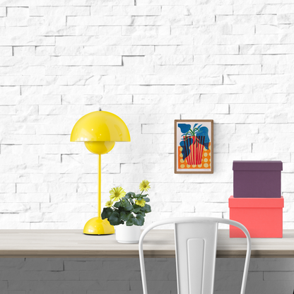 Colorful risograph print of a red-striped pot with bold blue and green foliage on an orange polka-dot background – Popcorn pot by Teresa Rego, A5 limited edition art print made in Portugal.