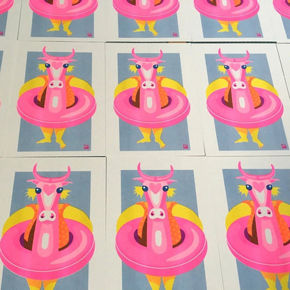 Playful risograph illustration of a child with a large pink inflatable cow float at the beach, in vibrant summer colors – Kid with Floating Cow by VrijFormaat – A4 art print.