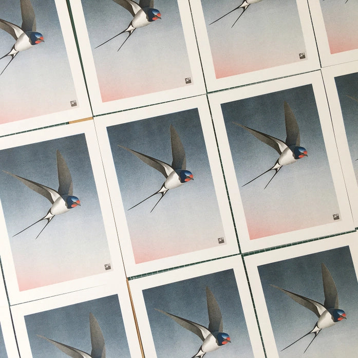 Elegant and minimalist illustration by Vrijformaat titled 'Barn Swallow,' featuring a sleek swallow in mid-flight against a smooth gradient background that transitions from soft pink to deep blue. This refined composition captures the grace and motion of the bird with clean lines and subtle texture—ideal for nature lovers, bird enthusiasts, and fans of serene, contemporary design