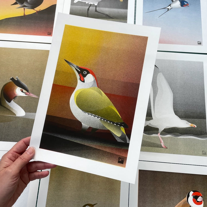 Colorful risograph art print of a European Green Woodpecker (Picus viridis) by VrijFormaat, minimalist bird illustration in yellow, green, and red tones on A4 eco-friendly paper – modern wall art made in the Netherlands