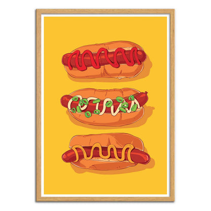 Hotdog Yellow by Barrie Jones – 30x40 cm art print featuring three illustrated hotdogs with ketchup, mustard, and toppings on a bright yellow background. Fun and modern kitchen wall art inspired by food culture.