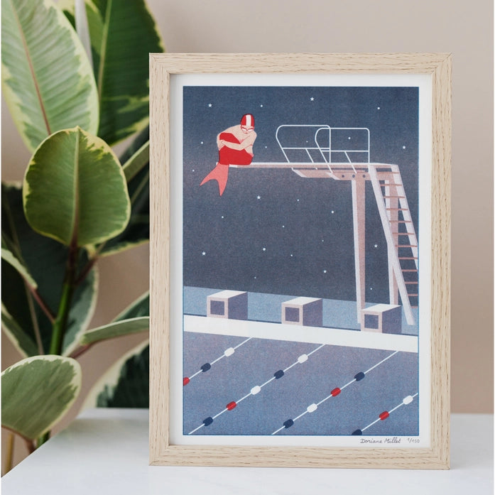 Art print of a modern mermaid sitting on a diving board under a starry sky in a swimming pool, risograph by French illustrator Doriane Millet – limited edition A4 illustration printed in France.