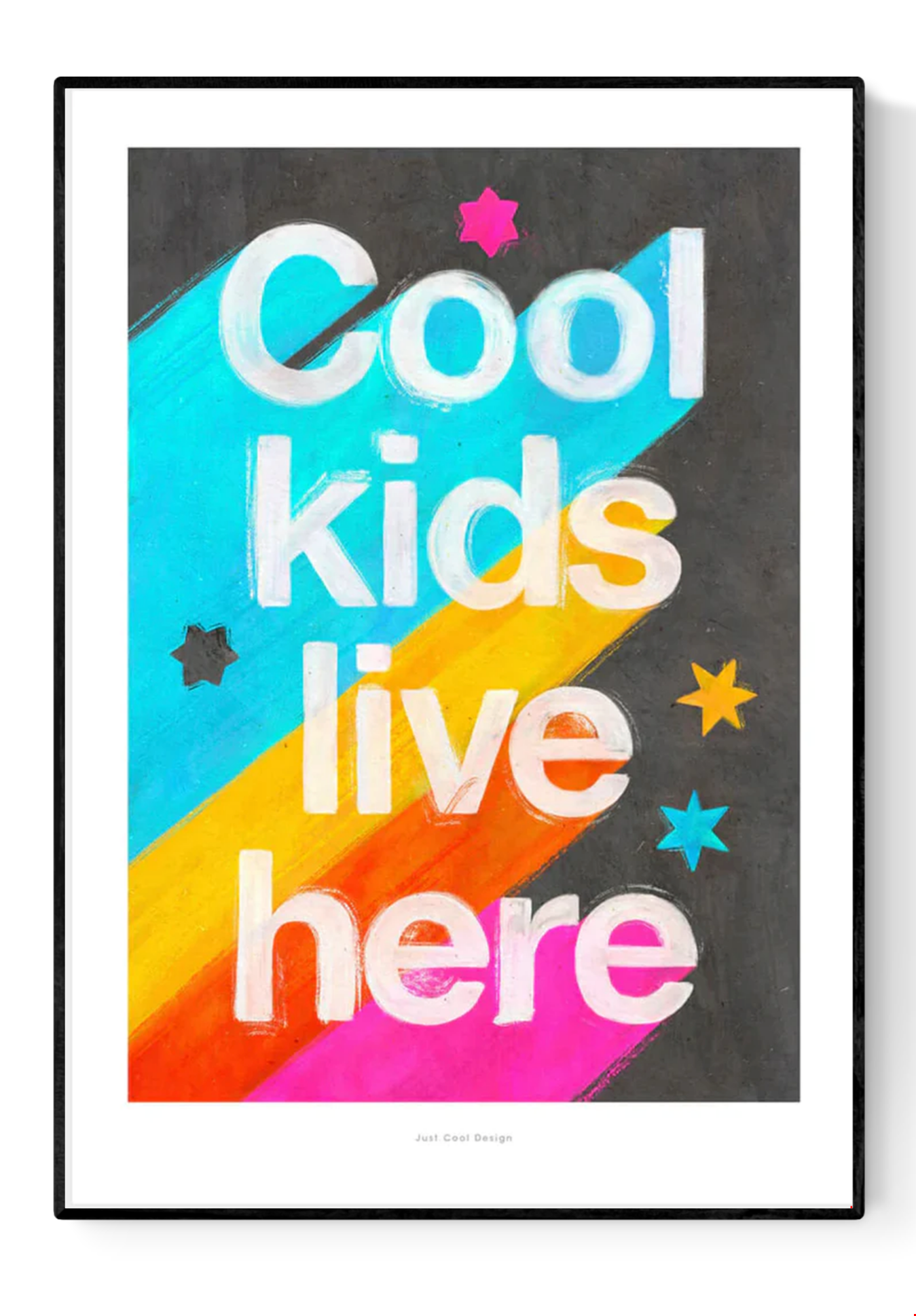 Giclée art print by Just Cool Design with the phrase "Cool kids live here" in bold white letters over a bright rainbow background with stars, ideal for colorful children's rooms or playful modern decor.