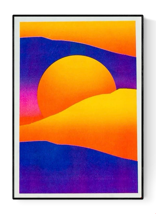 Striking 12.5 x 17.5 cm risograph print of a surreal desert landscape with glowing orange sand dunes, deep purple shadows, and a radiant yellow sun setting behind rolling hills. Modern minimalist wall art with bold colour contrast, designed by Dutch illustrator PTRVRKD and handprinted in the Netherlands using eco-friendly soy inks.