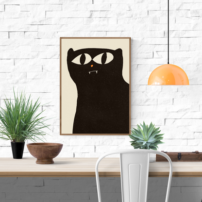 Minimalist black cat art print by Enikő Eged, featuring a bold black cat with large white eyes, tiny fangs and an orange nose on a soft cream background.