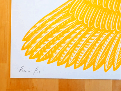 Vibrant risograph art print of a golden-yellow bird in flight wearing humorous pink polka-dot socks, titled Feelin’ Fly by Strangford, printed on recycled A3 paper in Northern Ireland.