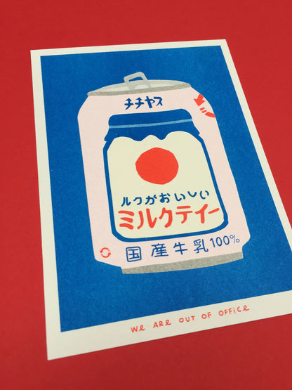 Japanese Can of Milky Tea risograph print by We Are Out of Office – bold and colorful pop-art illustration of retro Japanese drink can in blue, red, and cream tones, printed with soy ink on 300g Biotop paper.