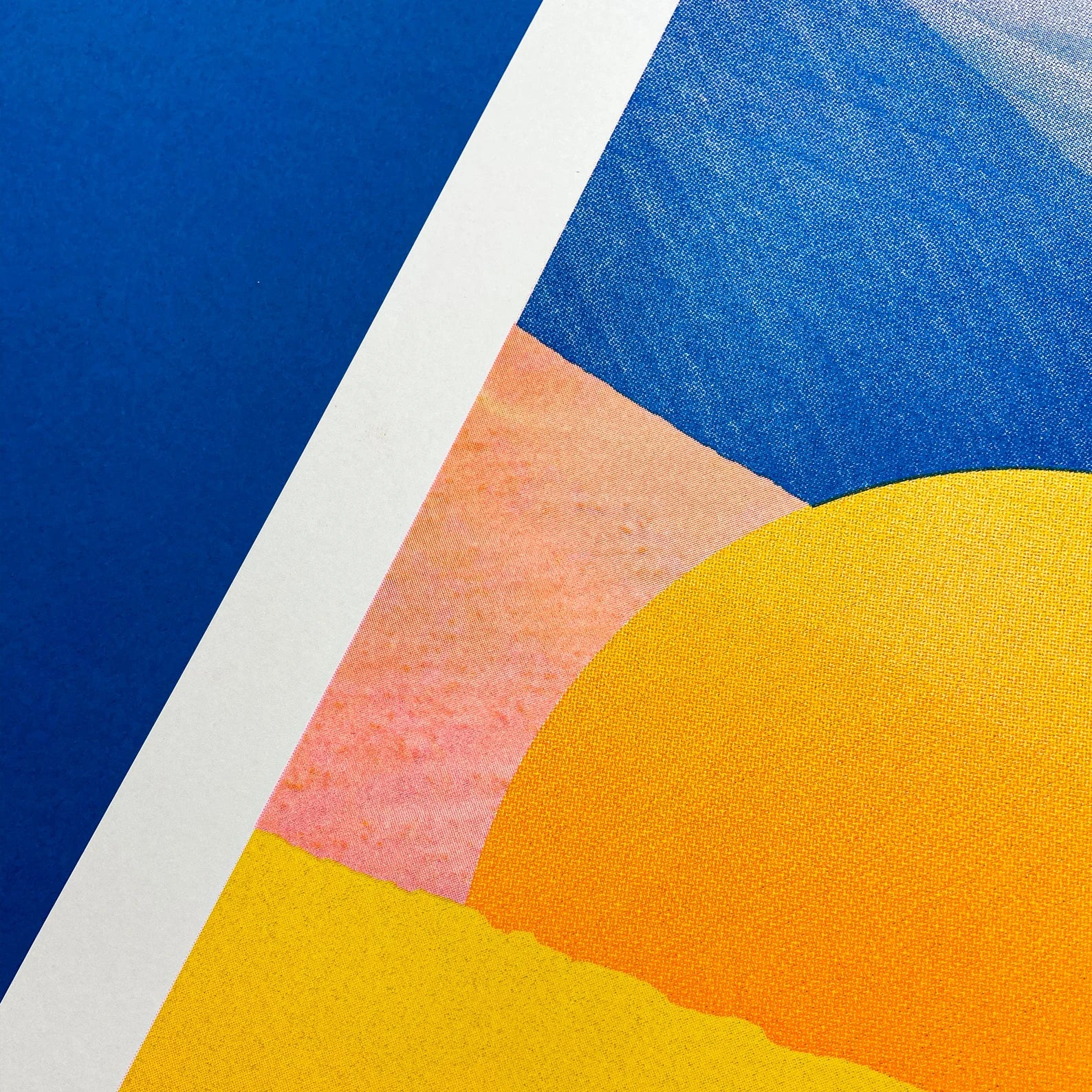 Minimalist desert art print with bold yellow sun and African dune landscape in vivid blue, orange, and peach tones by Dutch artist PTRVRKD – A3 risograph print, limited edition, eco-friendly ink.