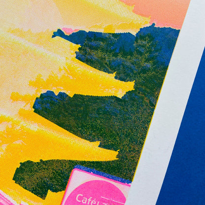 Bold Japan-inspired art print with pink urban street scene, cyclist, yellow Fuji pagoda silhouette and deep blue mountain background – Fuji Landscape Collage 2 by Dutch artist PTRVRKD, A3 risograph print, limited edition.