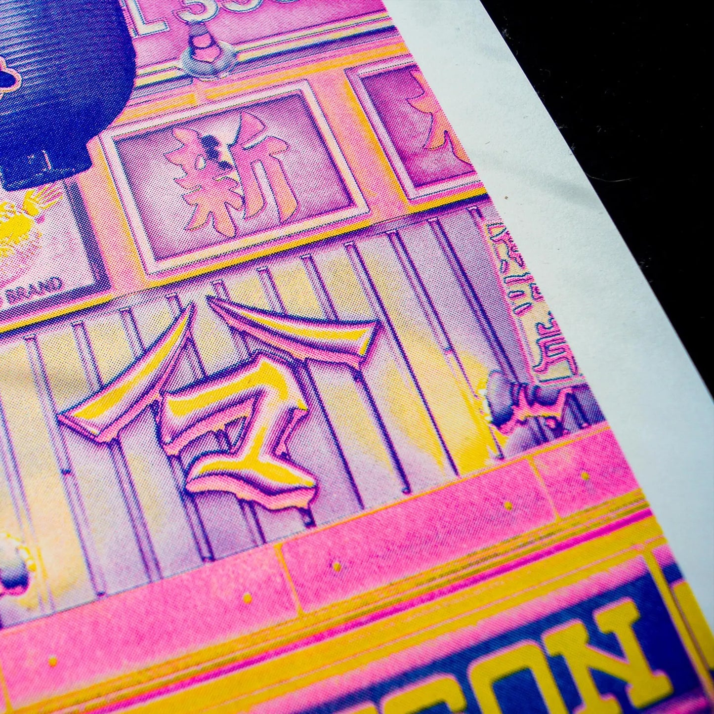 A3 risograph collage print of a surreal Tokyo street scene with fish and lanterns by PTRVRKD, handmade in bold pink, blue, and yellow tones.