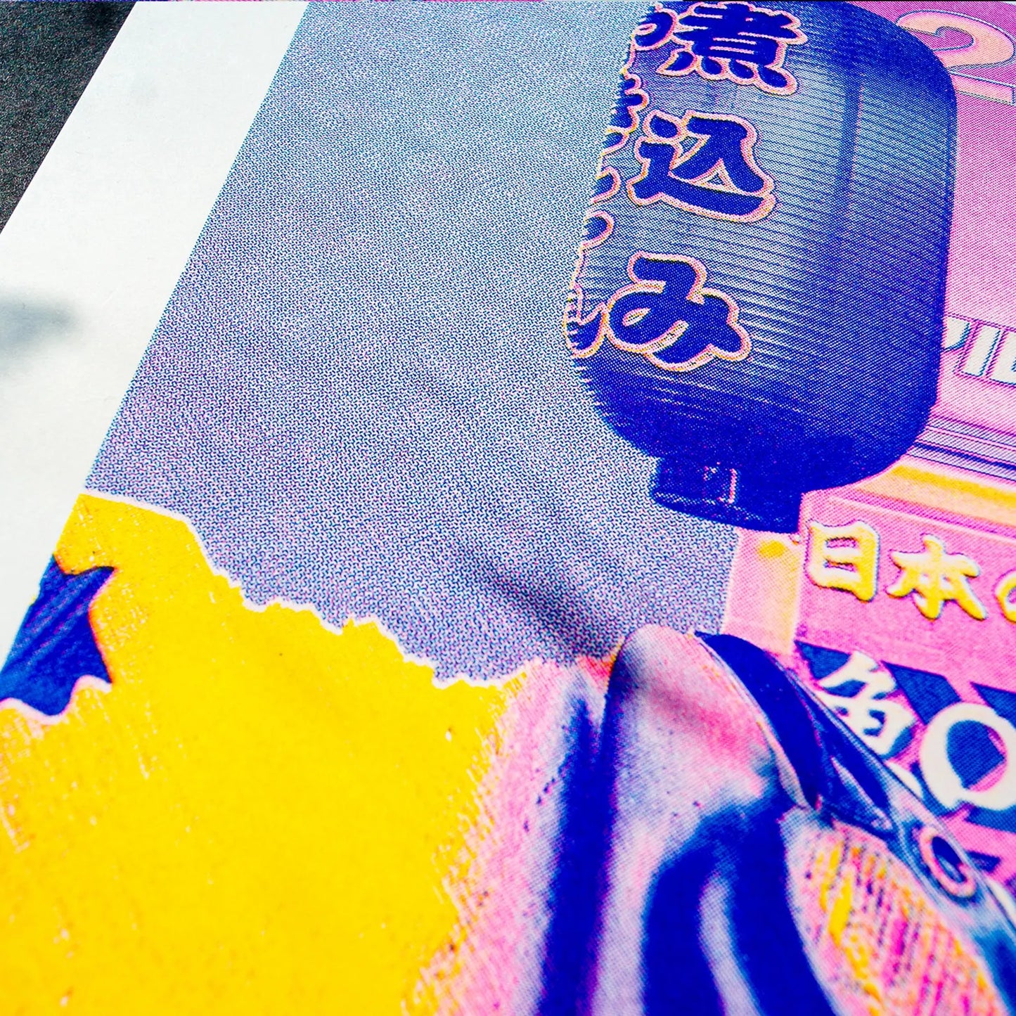 A3 risograph collage print of a surreal Tokyo street scene with fish and lanterns by PTRVRKD, handmade in bold pink, blue, and yellow tones.