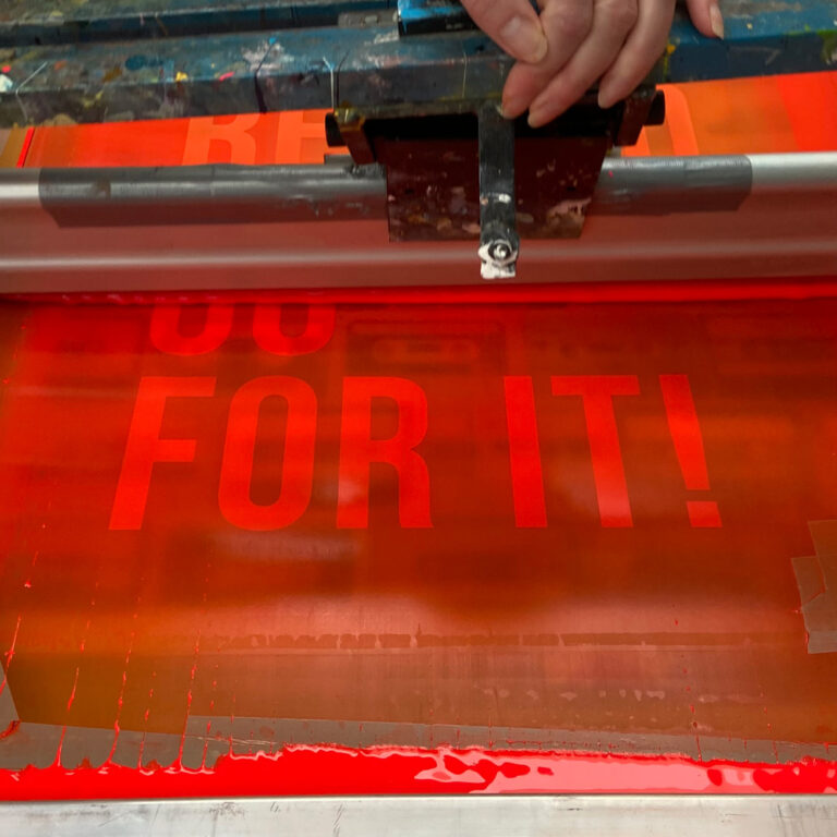 Life Has No Rewind motivational art print by Gumbootz, 50×70 cm screen print with neon-orange typography over turquoise cassette background, bold contemporary wall art for modern homes, inspirational poster for design lovers.