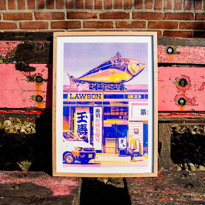 Vibrant risograph print of a Japanese Lawson store with oversized tuna sculpture on top, created by PTRVRKD in CMYK on A3 Biotop paper. Limited edition art print with bold pink, yellow, and blue tones, hand-signed and numbered.