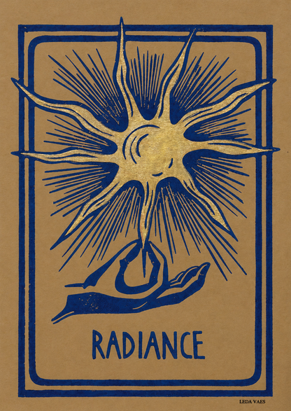 Radiance linocut print by Belgian artist Leda Vaes featuring a golden abstract sun with blue rays and a hand illustration on handmade paper in A4 format.