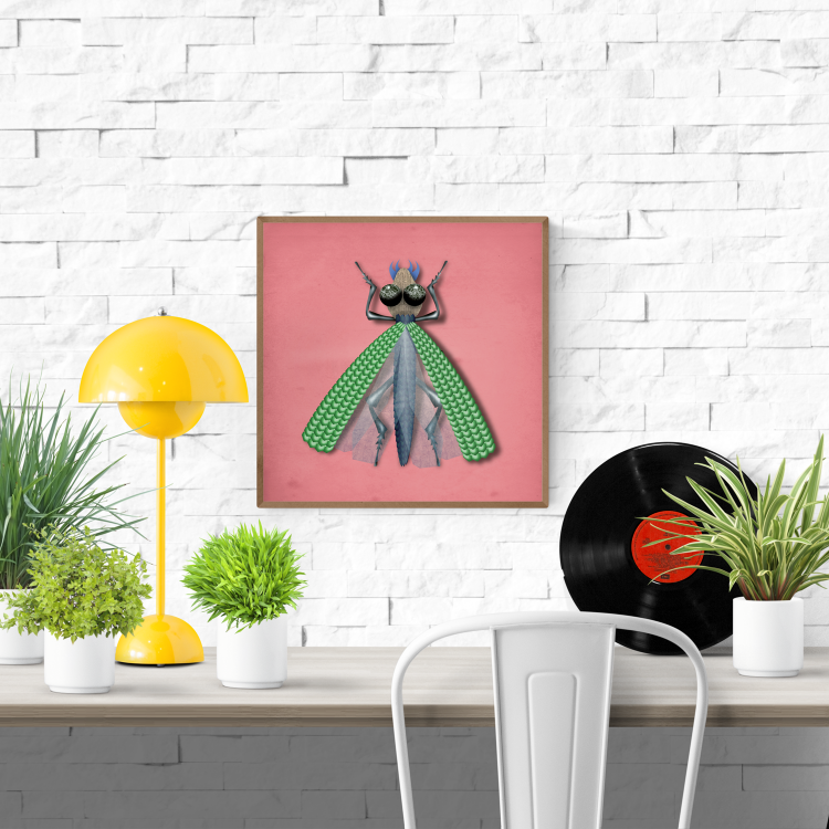 Freya Veps insect art print by Studio Frits – whimsical illustration of a colorful bug with green textured wings, newspaper-patterned eyes, and a soft pink background, perfect for modern wall decor and insect-themed artwork lovers